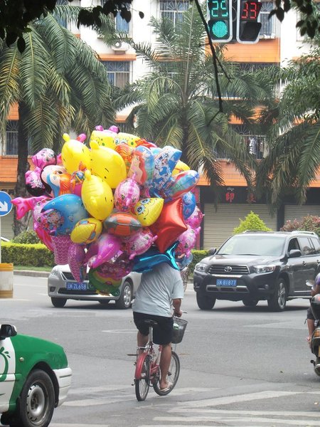 Balloon guy in traffic