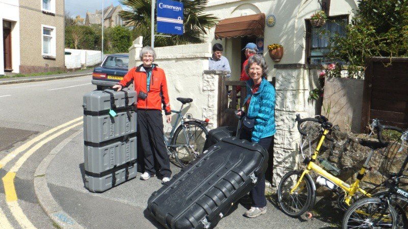 Karen and Kathy getting ready to take bike cases to post office