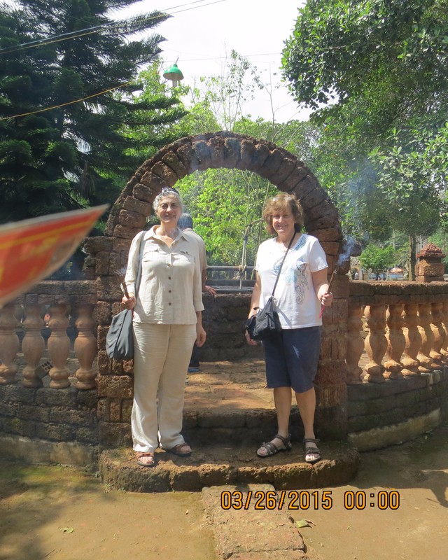 Linda and Maureen at ancient well at Tienh An pagoda