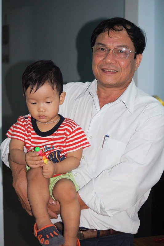 Mr Tung's father Tran Tam and son Tran Hong Quan