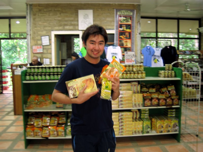 Happy Loner Traveller Buying Mango Products