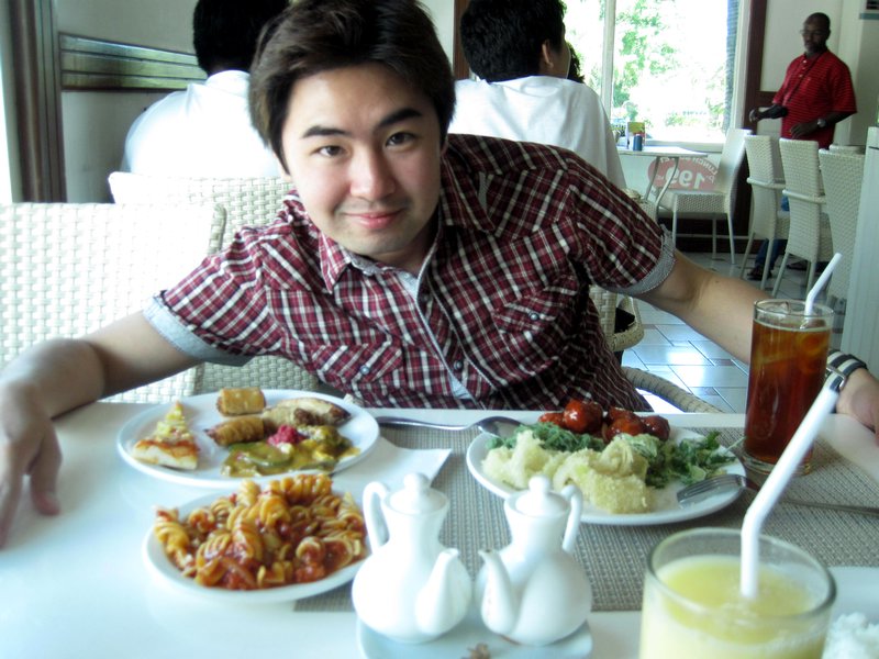 Happy Loner Traveller having Buffet In Cebu