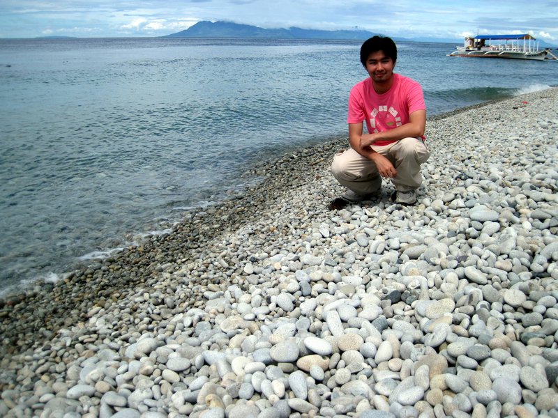 Happy Loner Traveller In Mabua Pebble Beach, Surigao City, Surigao Del norte
