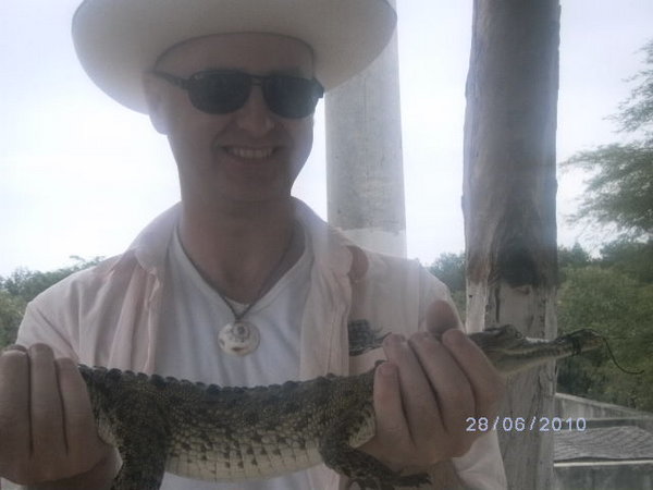 Hugh with baby croc