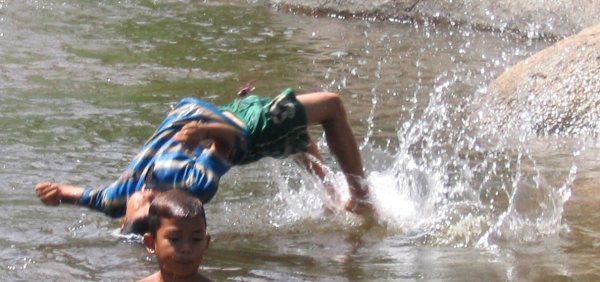Kids playing in the stream
