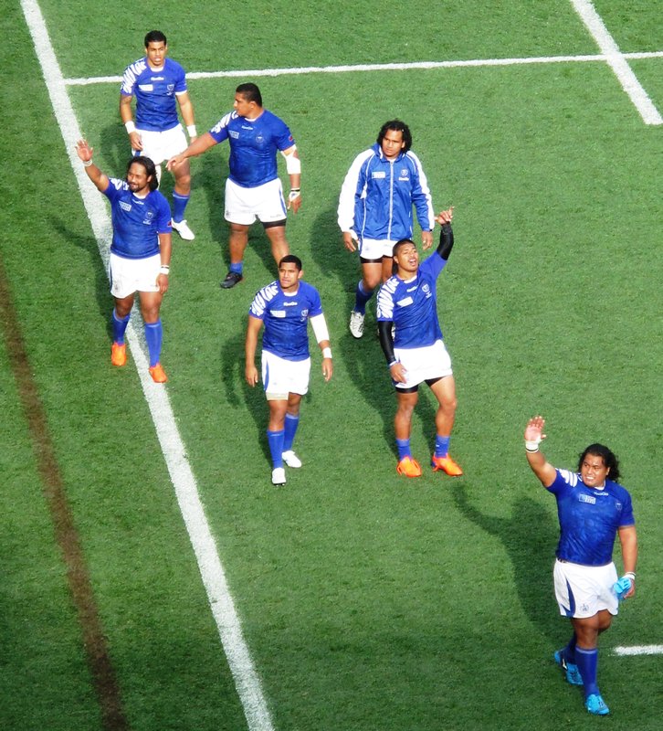 Samoan team do a lap of honour after beating Fiji
