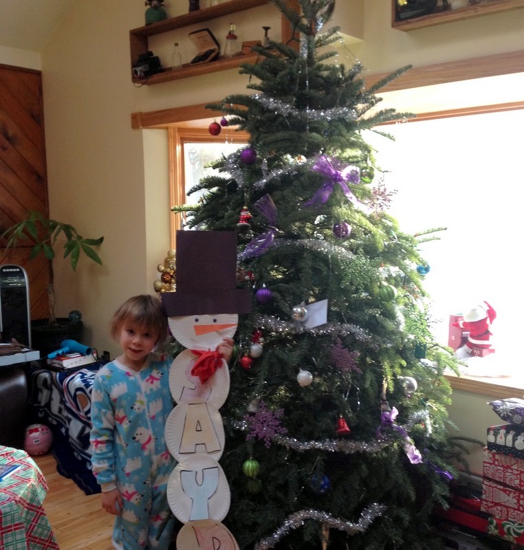 Saydi and the Christmas Tree in her home