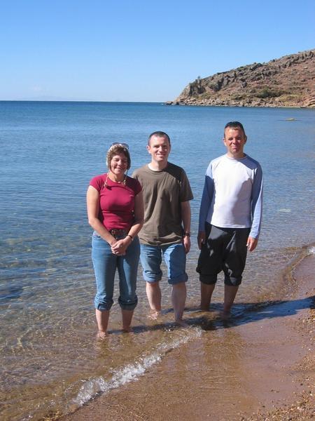 Paddling in Lake Titicaca with Anne and Dylan at the beach