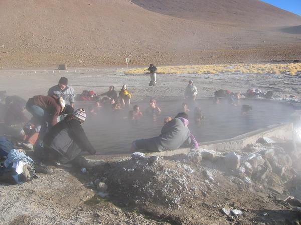 Brave (or stupid) people in a swimming pool fed by the natural hot water (outside temperature was well below zero)