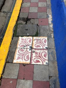  Patterned tiles around drain cover