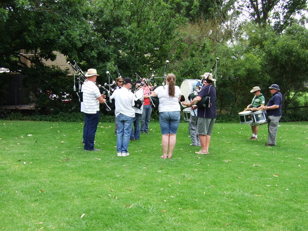 Pipe band busy practising in the park in Hahndorf