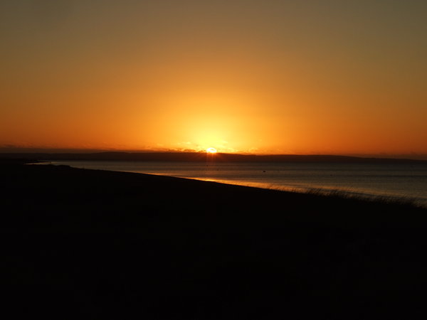 The sun sets over Geographe Bay