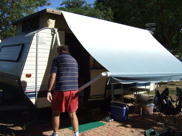Graham getting the awning down  