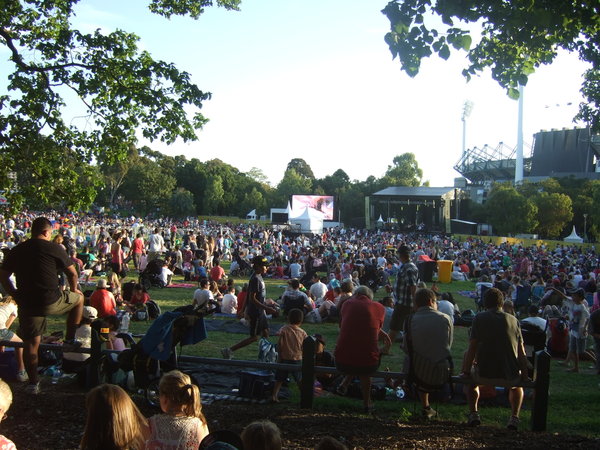In Yarra Park next to the MCG the crowds gather for the evening's entertainment