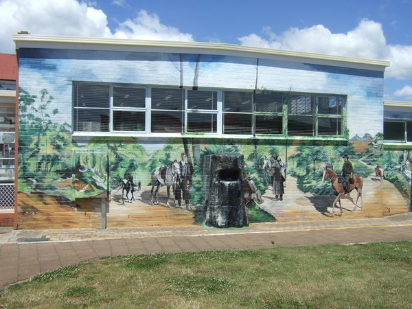 mural on the side of the Post Office building