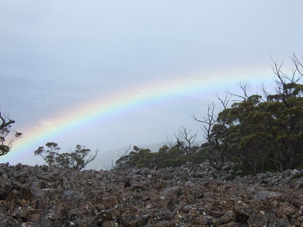 As we descend the mountain, through the cloud, we suddenly see this vivid rainbow