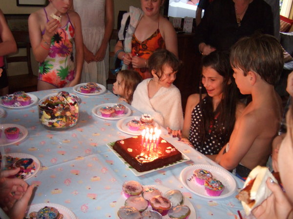 Charlotte about to blow out her candles