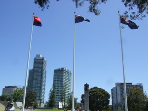 Aboriginal, National and Victoria's flags fly proudly near the War Memorial