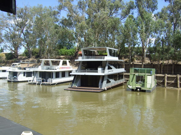 Many types and sizes of boats occupy the river