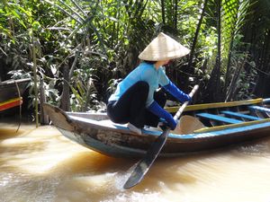 Mekong Delta - lady paddling.