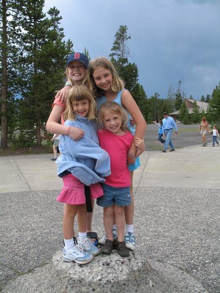 All 4 girls at Old Faithful (which actually impressed them)