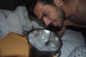 Yazan glaring at the bucket of ice they brought me