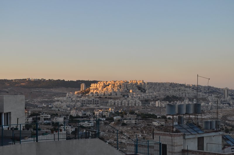 Sun setting over the illegal Israeli settlement
