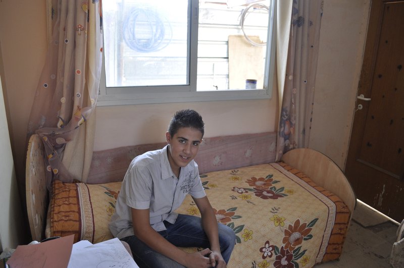 Saif, a young refugee in the camp