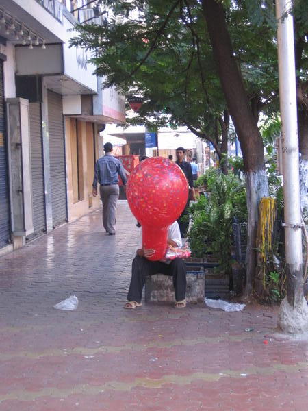 Man holding a huge balloon