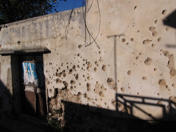 Building with bulletholes