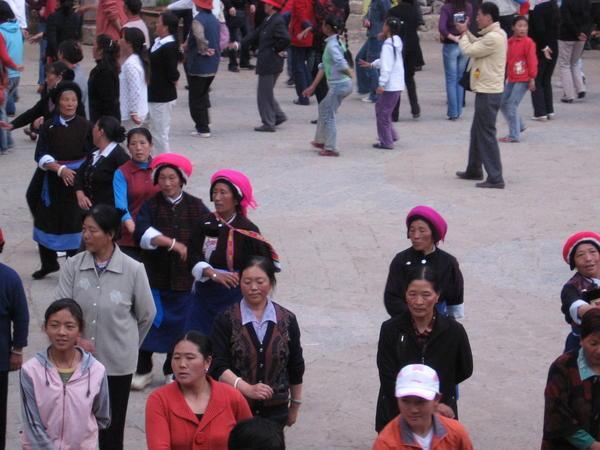 Tibetan and Naxi dancing in the main square 2
