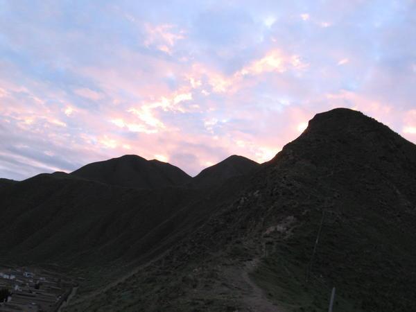 Sunset over Xiahe's mountains