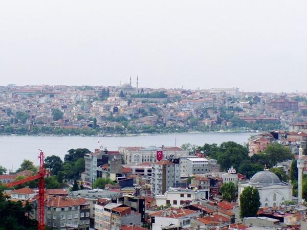 View across the Golden Horn from the highest point in Istanbul which is Tuksim Square.  In 2002 15M people lived in Istanbul (and 3 1/2M ride the Istanbul Ferry each work day)