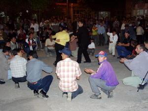 After the cermony for a Greek & Turkish wedding ended, the whole town turned out for a street dance, started by the men and eventually all but the very elderly were gyrating away