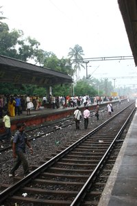 Train from Cherthala to Trivandrum, notice passengers lining up in the tracks!