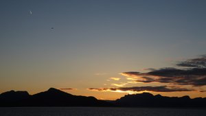 Approaching Bergen, two aircraft at sunrise