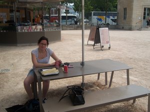 Kristy in outdoor cafe at Jardin des Plantes 