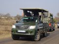 Safari Vehicles Watching the Lions