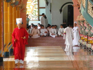 Cao Dai Priest and Adherents