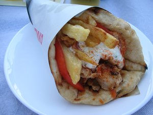 My gyro from the beach bar (its got pork roasted on a spit, tomatoes, french fries, tzatziki, and some other sauce, all in a pita) my favorite!