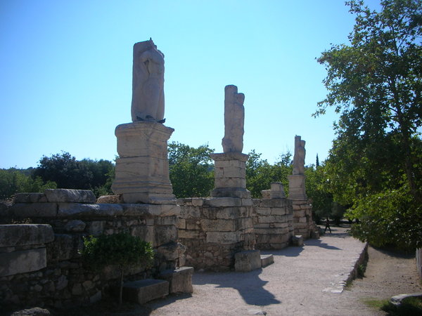 Some statues at the foot of the Acropolis
