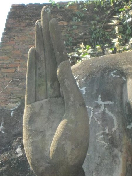 Buddha with hand extended