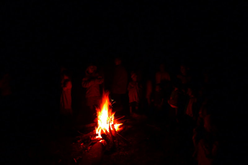 Campfire singing by the local kids