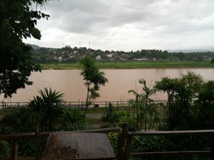 Looking across the river at Laos from our hostel in thailand. 