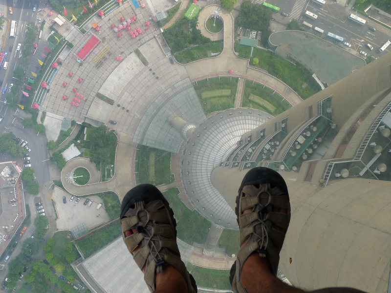 Standing over the glass tower