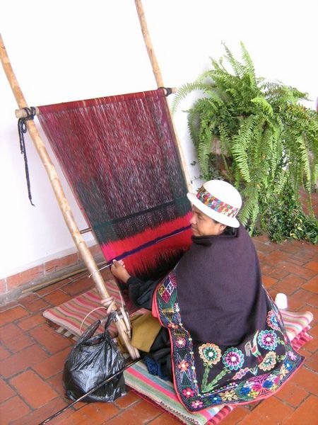 Woman weaving, Sucre