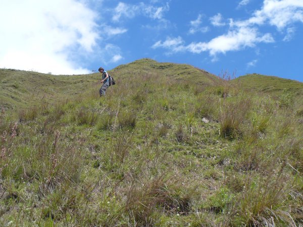 Descending the steep ridge