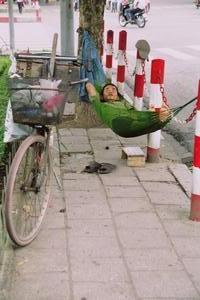 Sidewalk nap in Hanoi