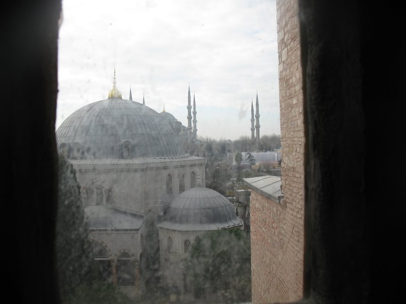 Blue Mosque viewed throug a window in Aya Sofya