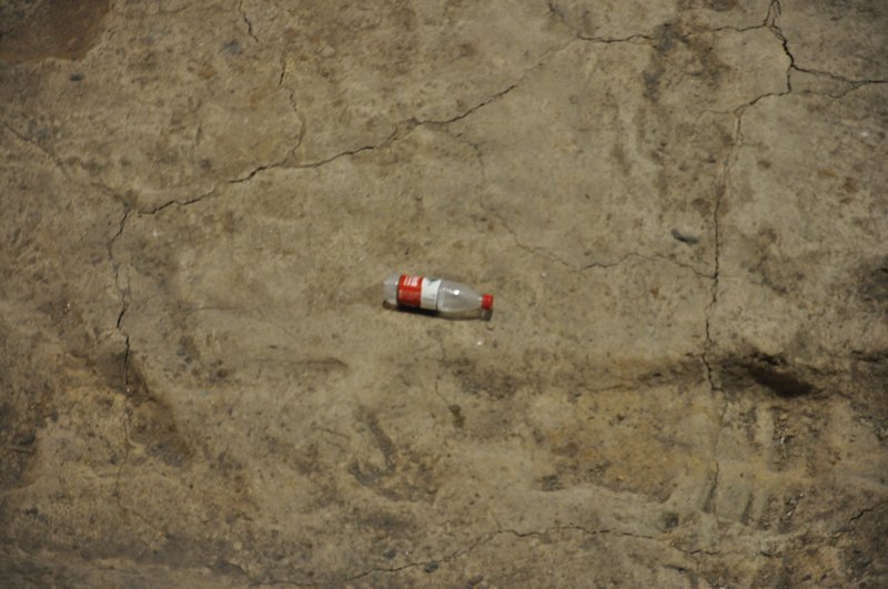 A bottle in one of the pits